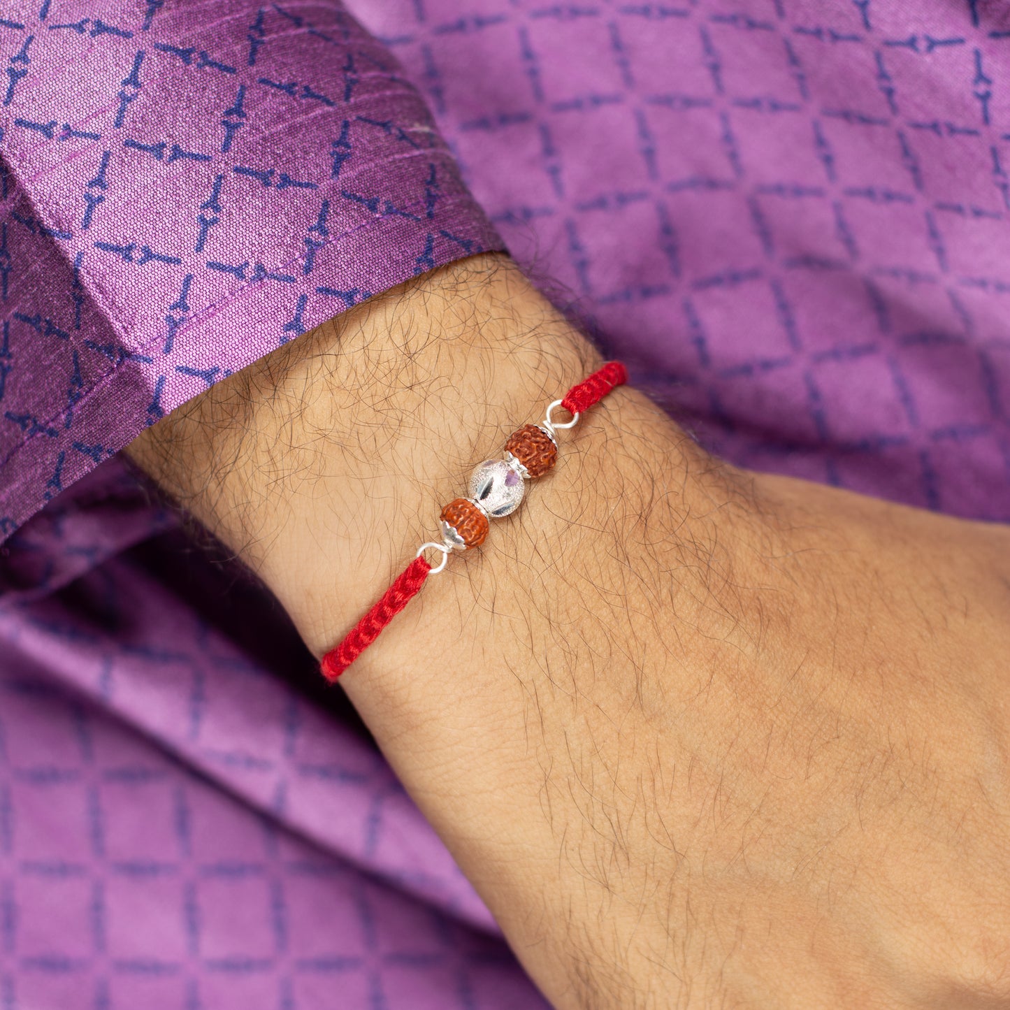 Divine Rudraksha and Floral Motif Silver Rakhi