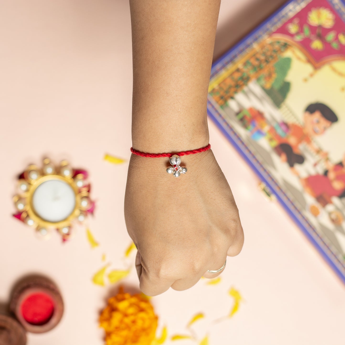 Traditional Ghungroo Rakhi with Red Thread