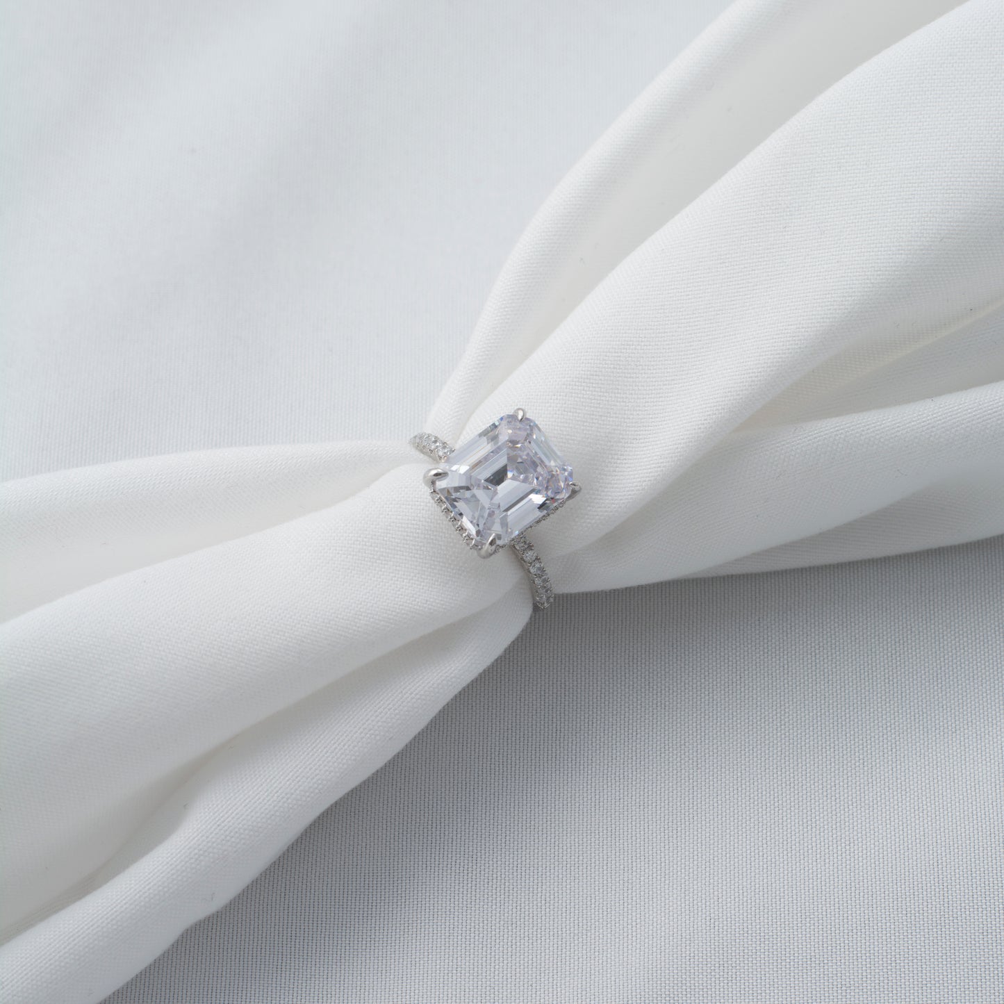 Silver Solitaire Ring with Emerald Cut Diamond