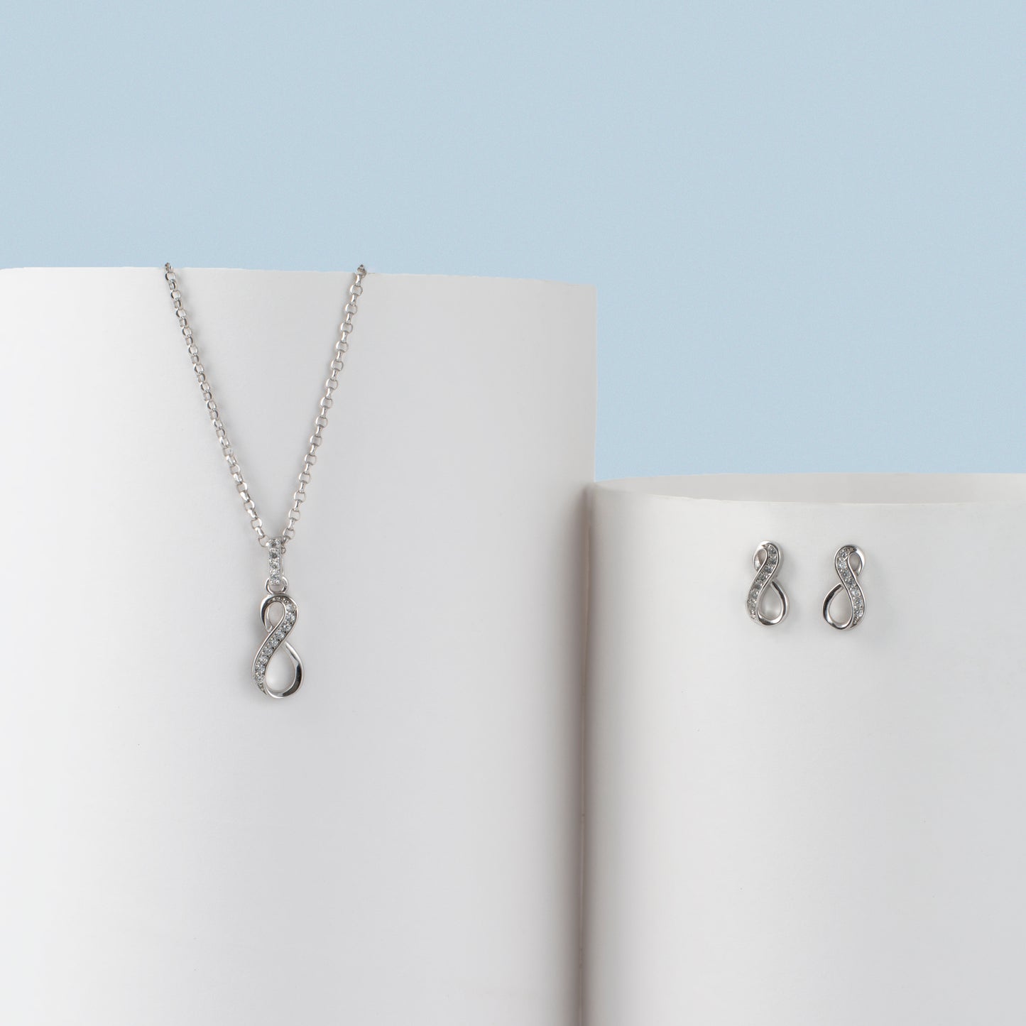 Silver Infinity Pendant and Earring Set with Diamond Accents