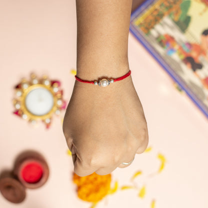 Elegant Silver Bead Red Rakhi
