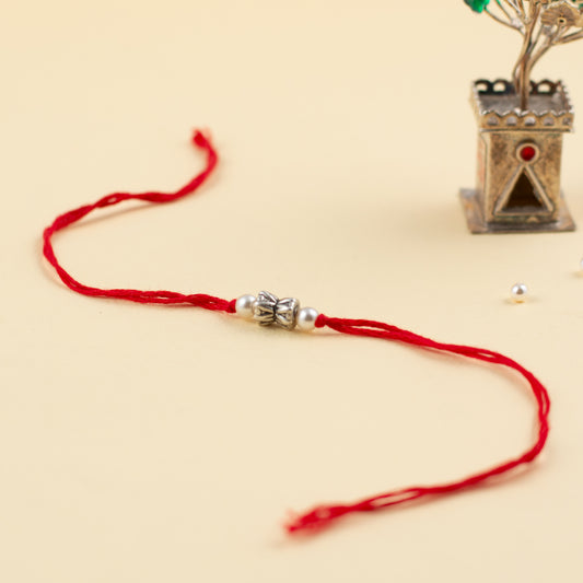 Silver Damru With Pearl Rakhi