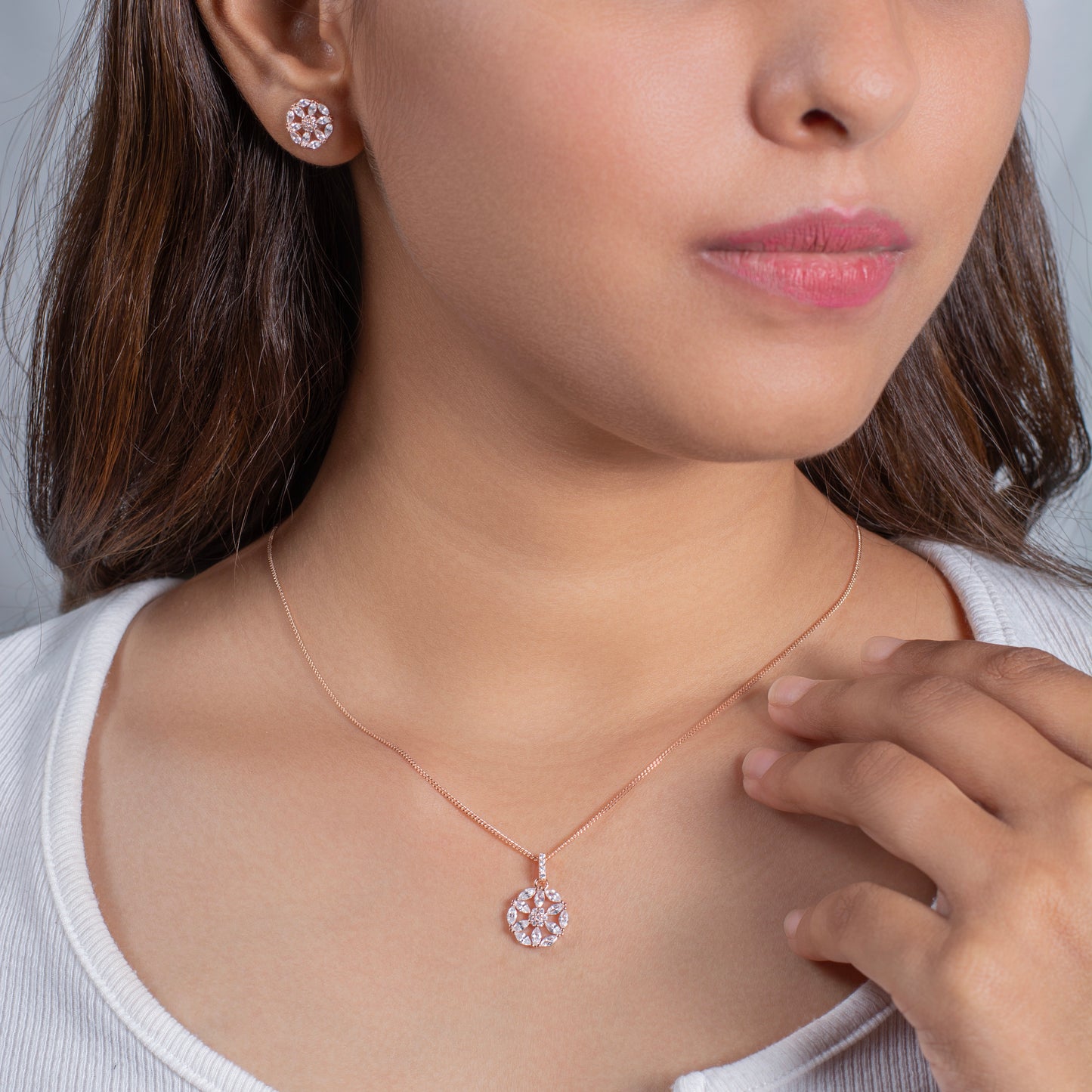 Rose Gold Snowflake Pendant and Earring Set with Crystal Accents