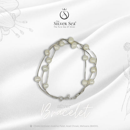Triplet Lumière: Sterling Silver Triple Strand Bracelet with Pearls