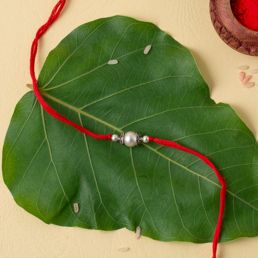 Elegant Silver Bead Red Rakhi