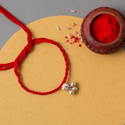 Traditional Ghungroo Rakhi with Red Thread