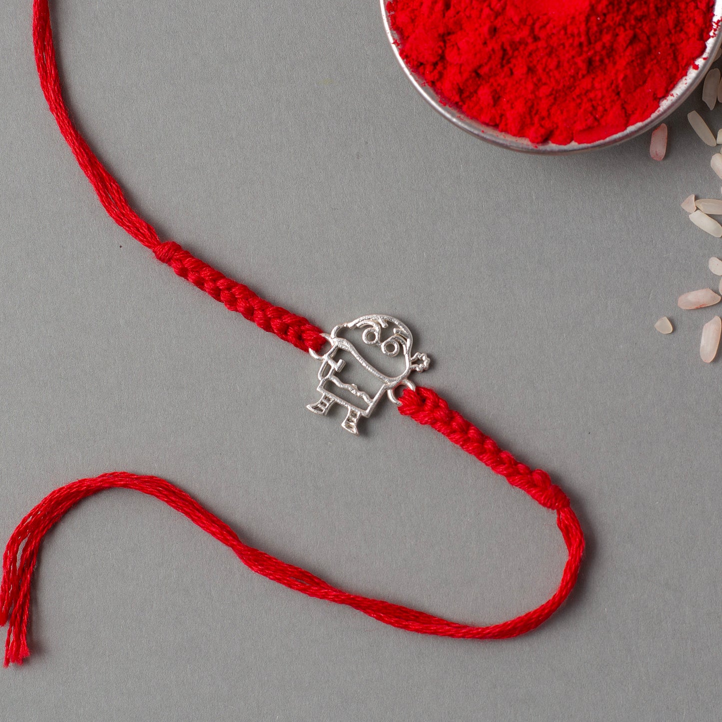 Adorable Cartoon Character Rakhi with Red Thread